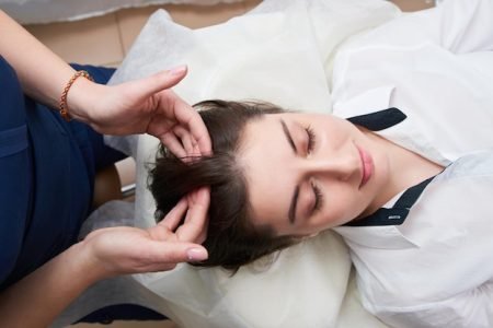 portrait-young-woman-lying-down_1048944-7385212